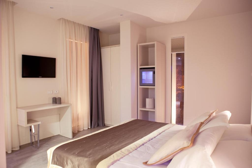 L'Hotel Rimini Camera foto